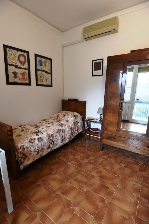 A bed or beds in a room at B&B Tou Lì
