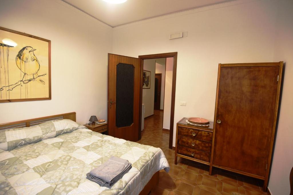 A bed or beds in a room at B&B Tou Lì