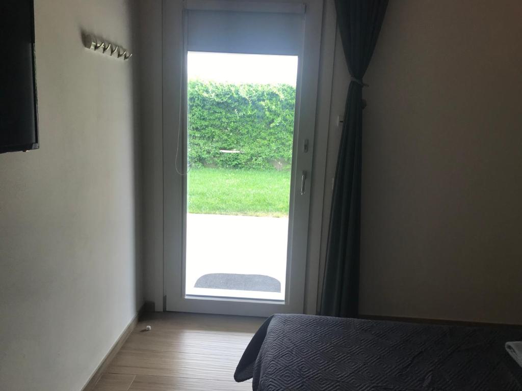 Łóżko lub łóżka w pokoju w obiekcie Dimora Aurora