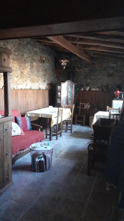 Posezení v ubytování Apartamentos y Casa La Paredana, agroturismo