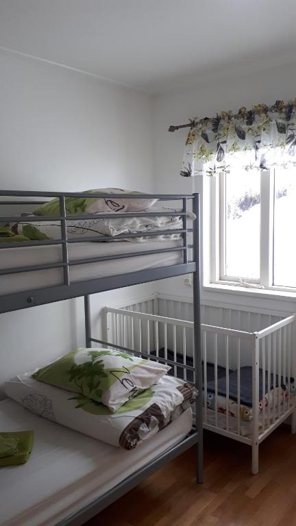 Postel nebo postele na pokoji v ubytování Brúnalaug Guesthouse - Holiday Home