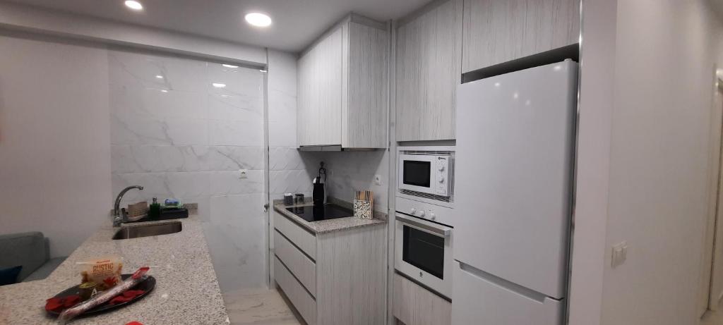 Kuchyňa alebo kuchynka v ubytovaní Apartamento Costa de Almería a 50m Playa San Miguel