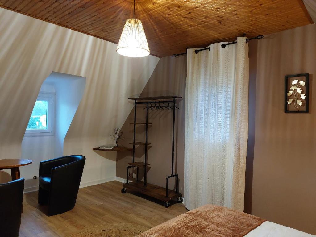 Postel nebo postele na pokoji v ubytování L'escale d'Armor