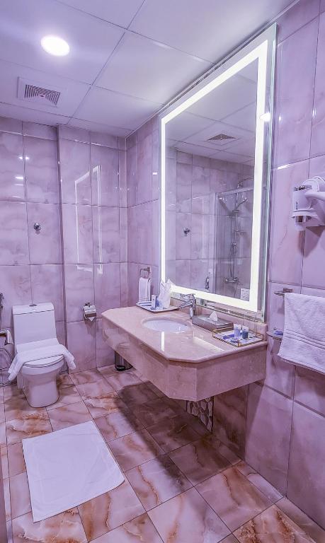 Vannituba majutusasutuses Signature Guest Hotel فندق إمضاء النزيل الفندقية