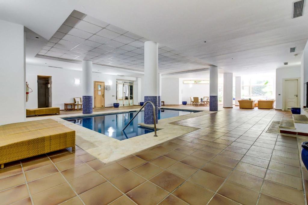 The swimming pool at or close to Colorlife Apartment