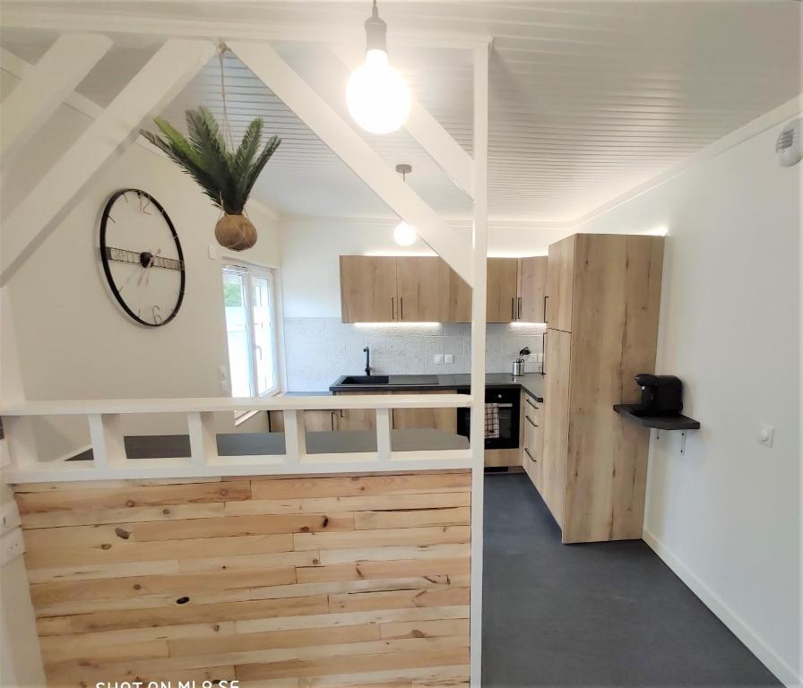 Kuchyňa alebo kuchynka v ubytovaní Maison des Pommiers - Bord de mer et campagne