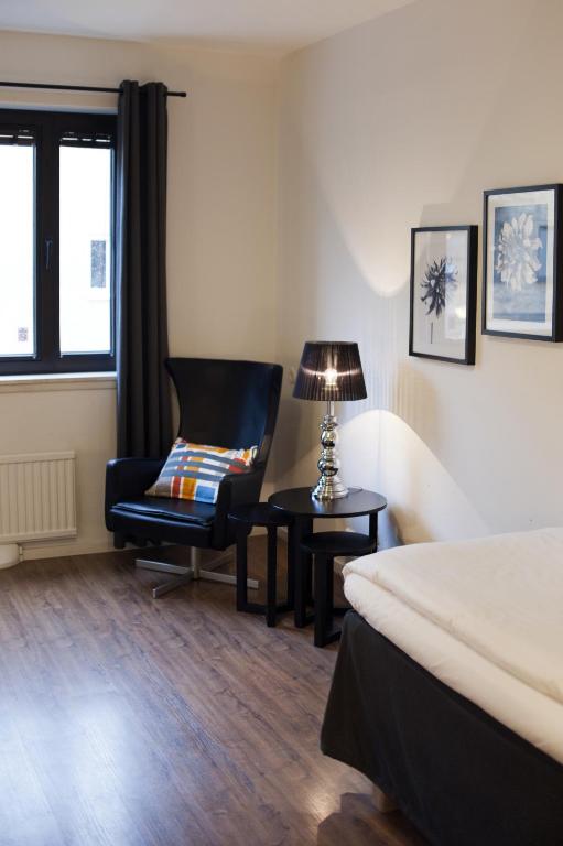 Postel nebo postele na pokoji v ubytování Centralhotellet