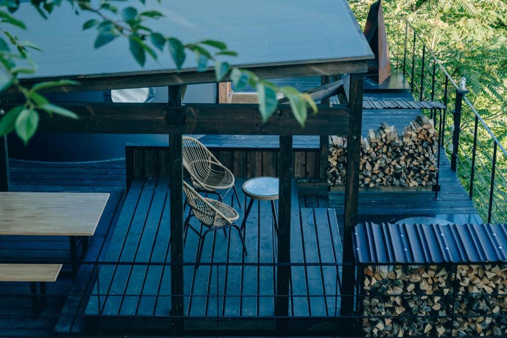 Balkón nebo terasa v ubytování つながるキャンプリゾートQOONEL+