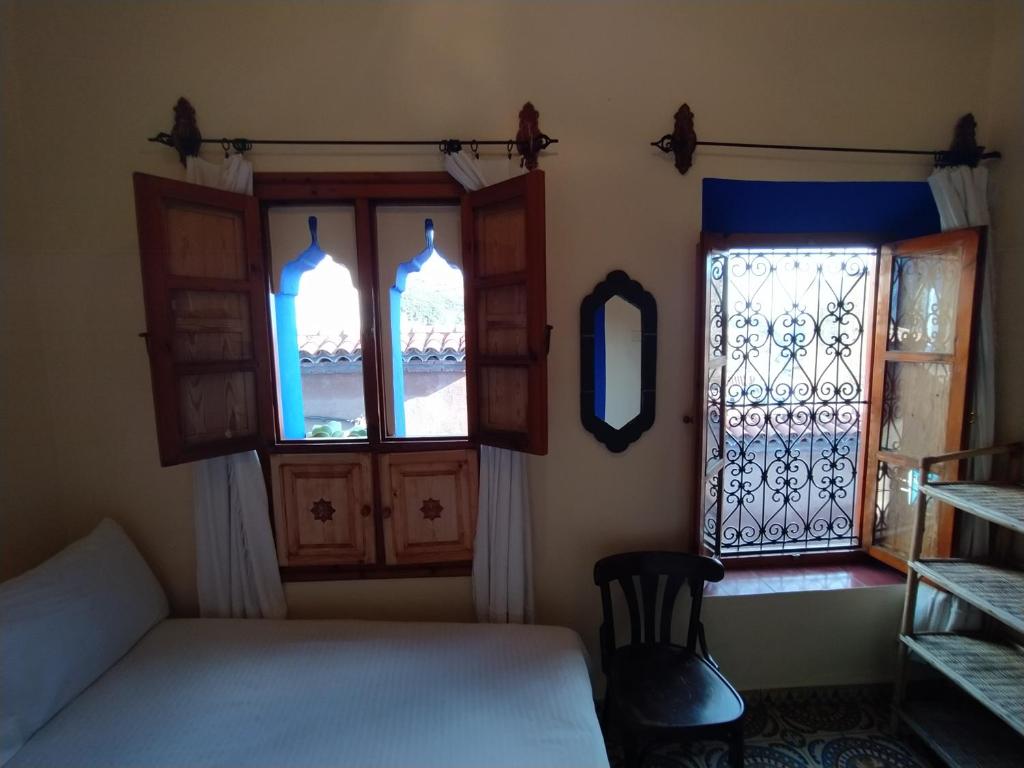 Voodi või voodid majutusasutuse Hotel Gernika toas