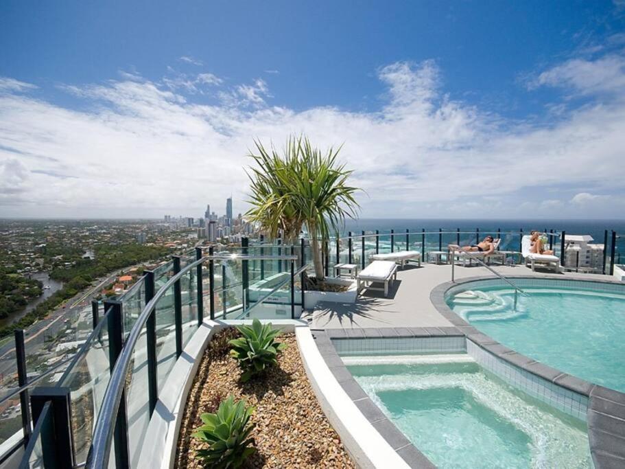 a balcony with a swimming pool on top of a building at 2203 The Wave in Gold Coast