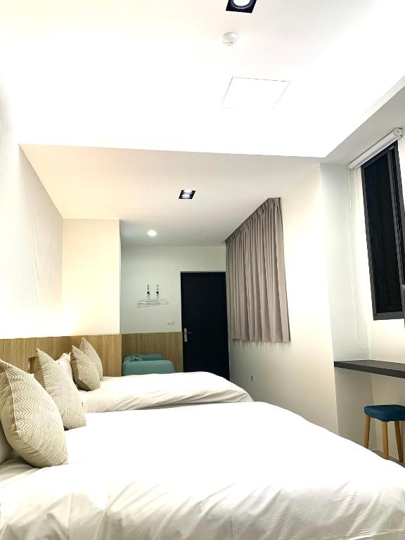 Postel nebo postele na pokoji v ubytování Jabez Homestay