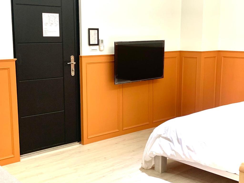 Postel nebo postele na pokoji v ubytování Jabez Homestay