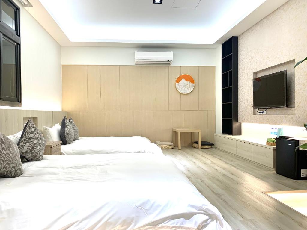 Postel nebo postele na pokoji v ubytování Jabez Homestay