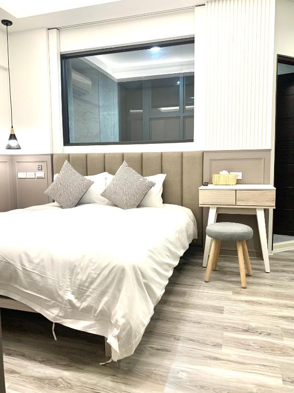 Postel nebo postele na pokoji v ubytování Jabez Homestay