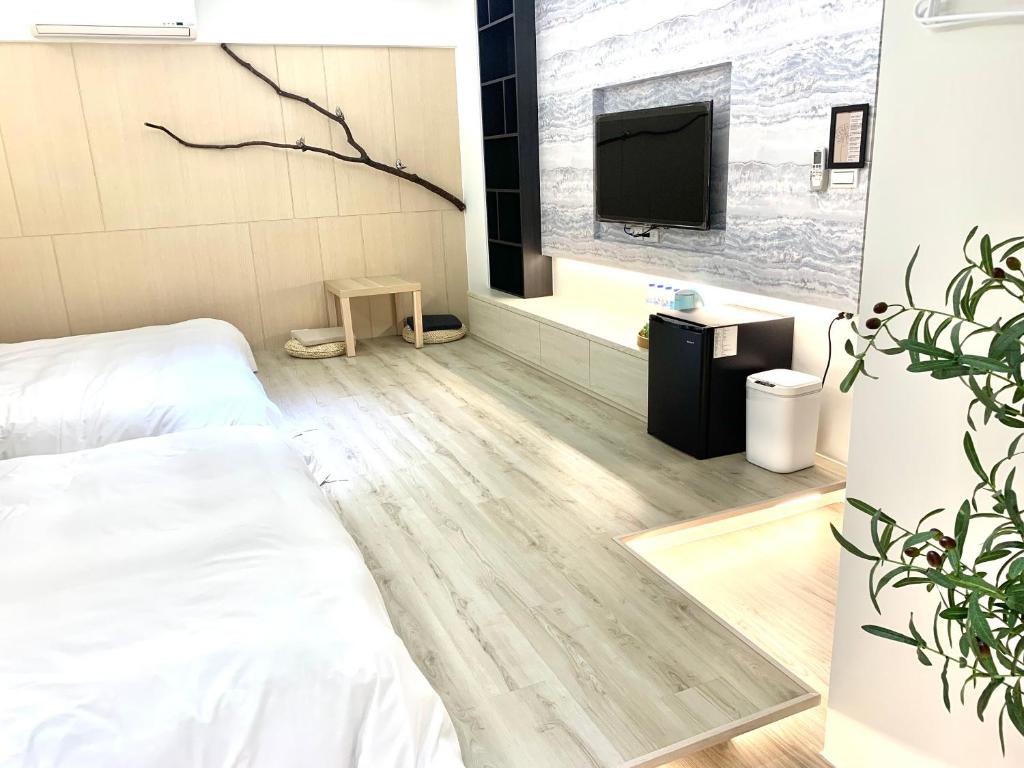 Postel nebo postele na pokoji v ubytování Jabez Homestay