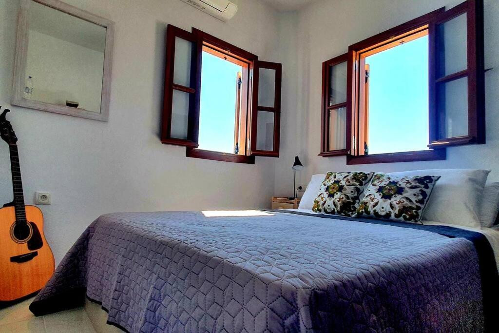 Postel nebo postele na pokoji v ubytování The Olive Tree Villa Lindos
