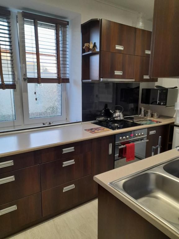 Kuchyňa alebo kuchynka v ubytovaní Apartament Mieszkanie w Helu