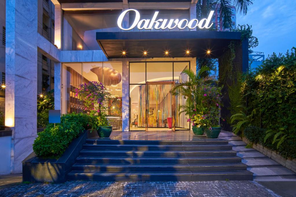 a store front with a sign that reads oakwood at Oakwood Hotel & Apartments Saigon in Ho Chi Minh City