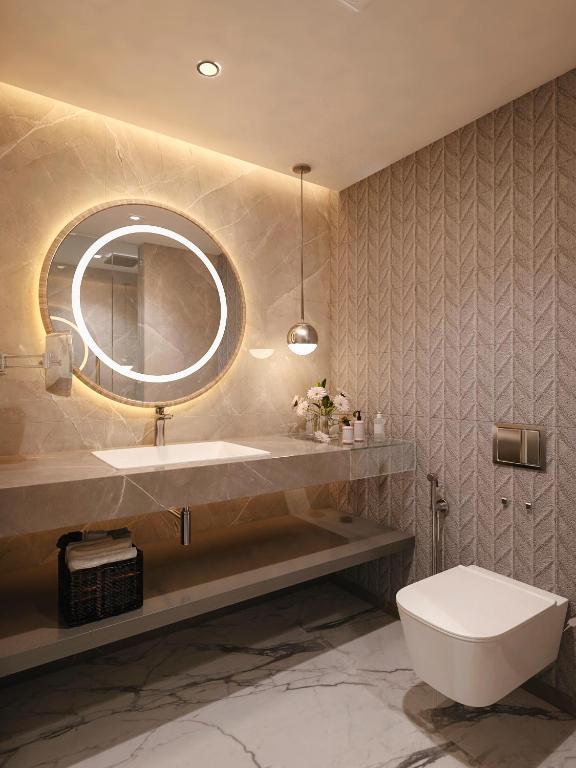 Koupelna v ubytování Vivanta Vijayawada, MG Road
