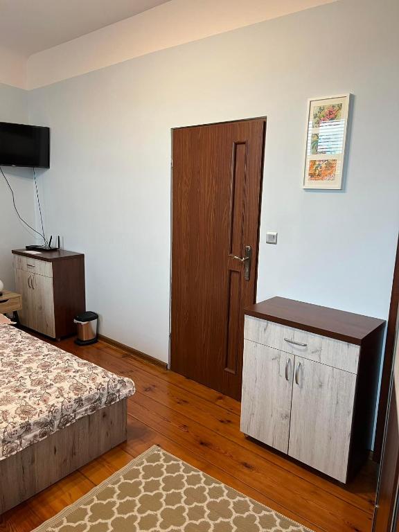 Postel nebo postele na pokoji v ubytování Jedności Hostel