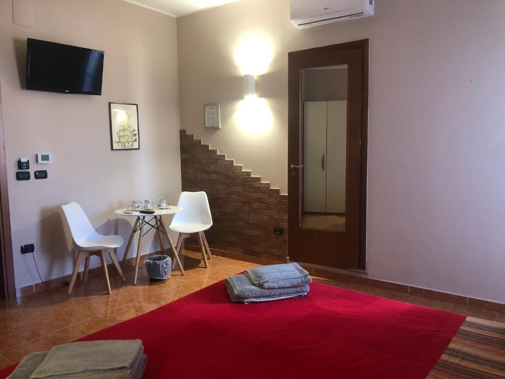 Posezení v ubytování Aurora Rooms