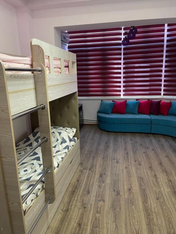 Postel nebo postele na pokoji v ubytování Flamingo
