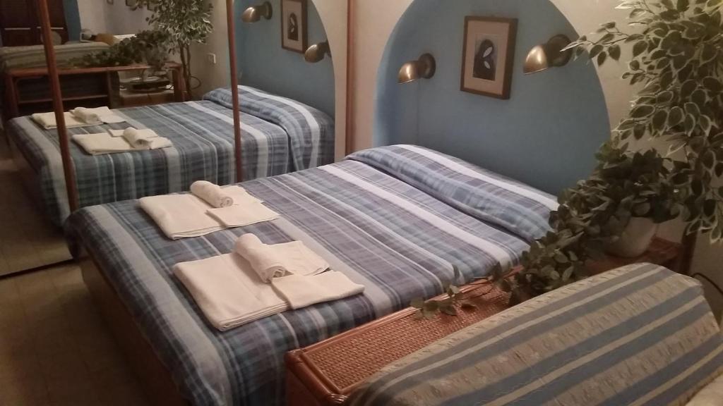 Posteľ alebo postele v izbe v ubytovaní Voce del Mare