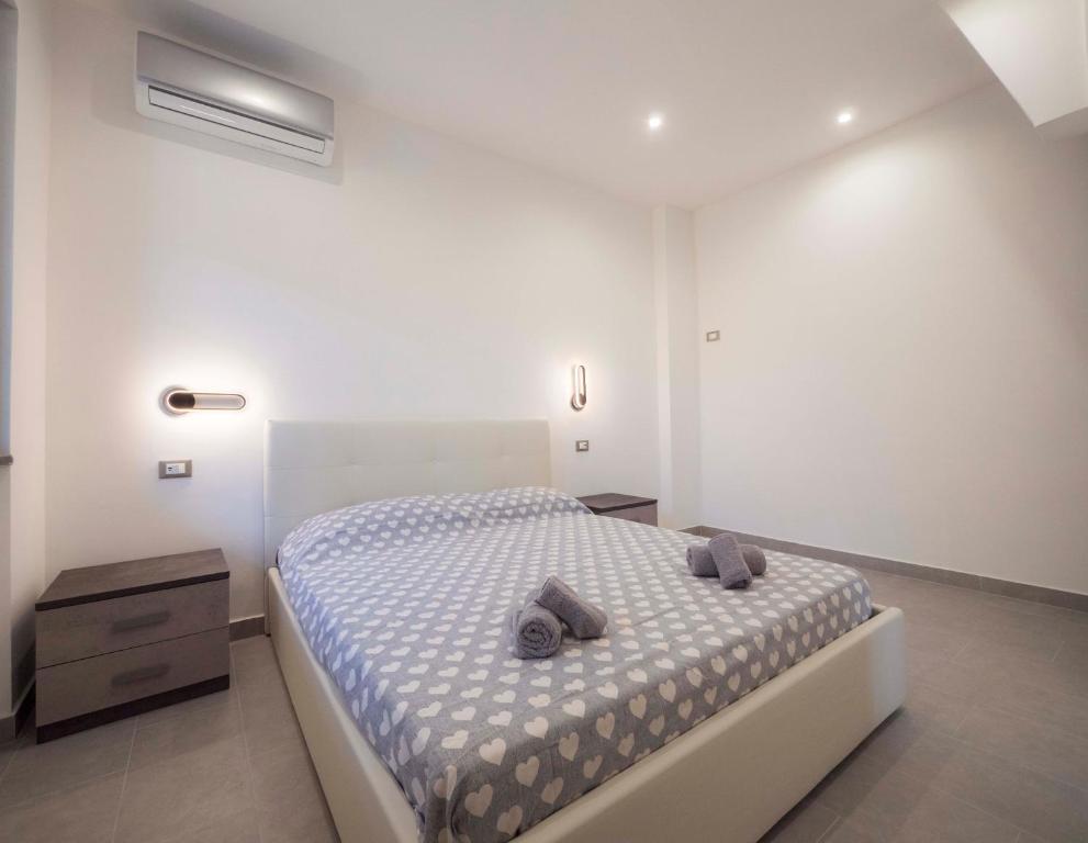 A bed or beds in a room at Villa Lisa casa vacanze