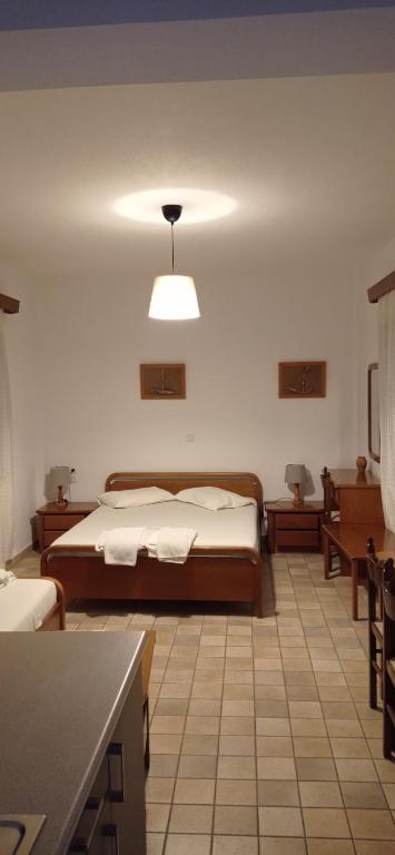 Posteľ alebo postele v izbe v ubytovaní Raptis Aparthotel Sivota