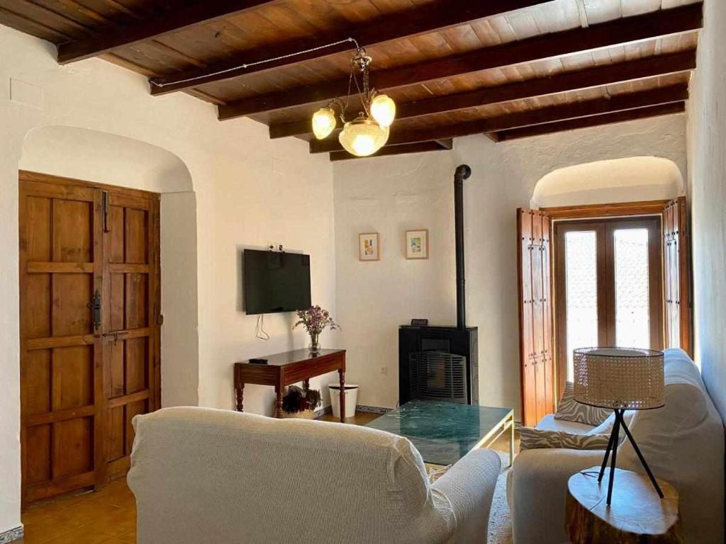 Telewizja i/lub zestaw kina domowego w obiekcie La Casona de la Sierra