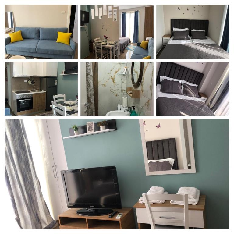 TV a/nebo společenská místnost v ubytování Rezidenca SHOPI Apartments