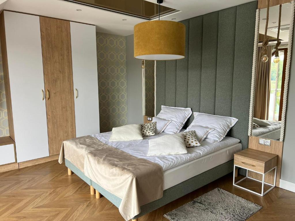 Posteľ alebo postele v izbe v ubytovaní Hotel Kormoran Resort & SPA