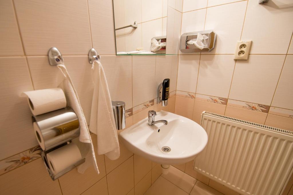 Koupelna v ubytování Hotel Clavis