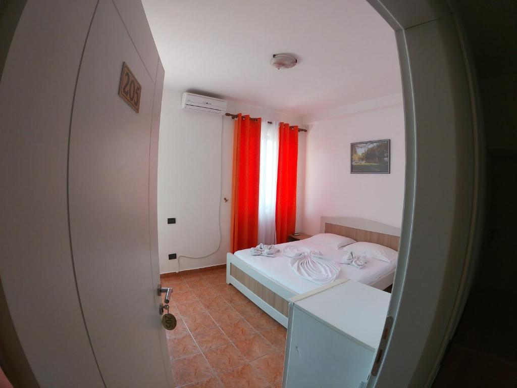 Postel nebo postele na pokoji v ubytování Hotel Bolonja