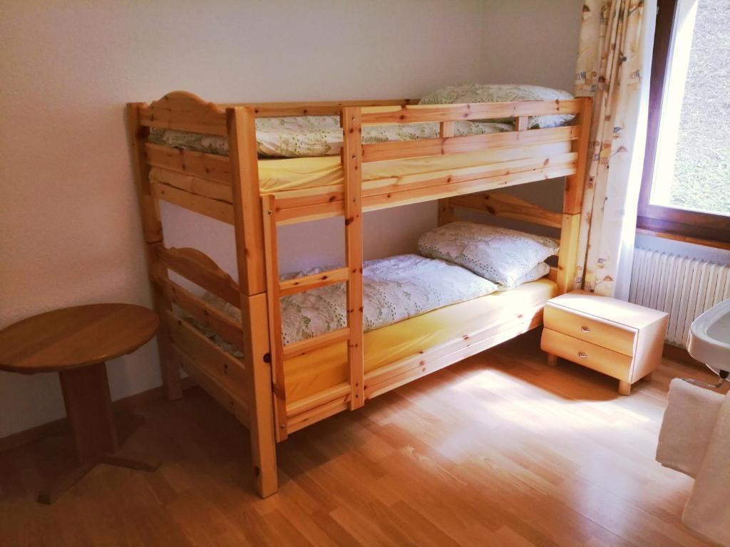 Postel nebo postele na pokoji v ubytování Hotel Gemmi