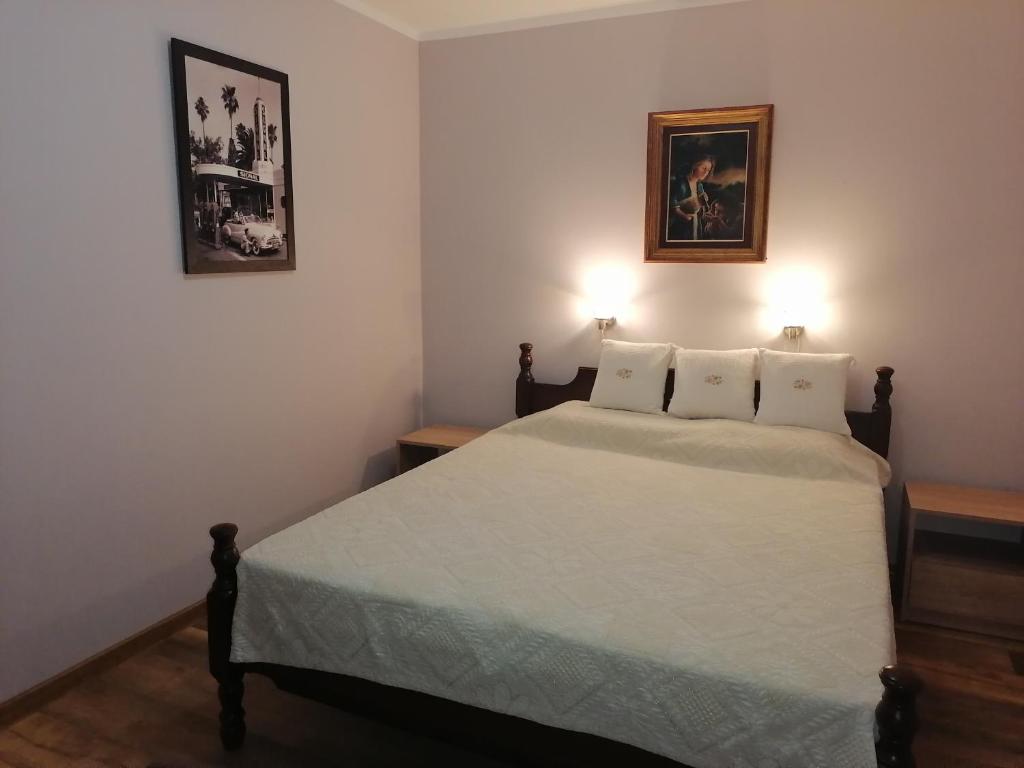 Postel nebo postele na pokoji v ubytování Apartman Sandrina