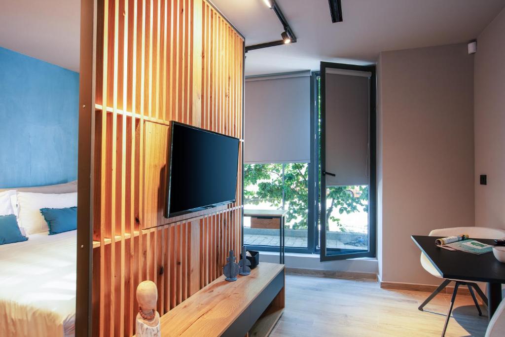 TV a/nebo společenská místnost v ubytování Souda Plaza Collection