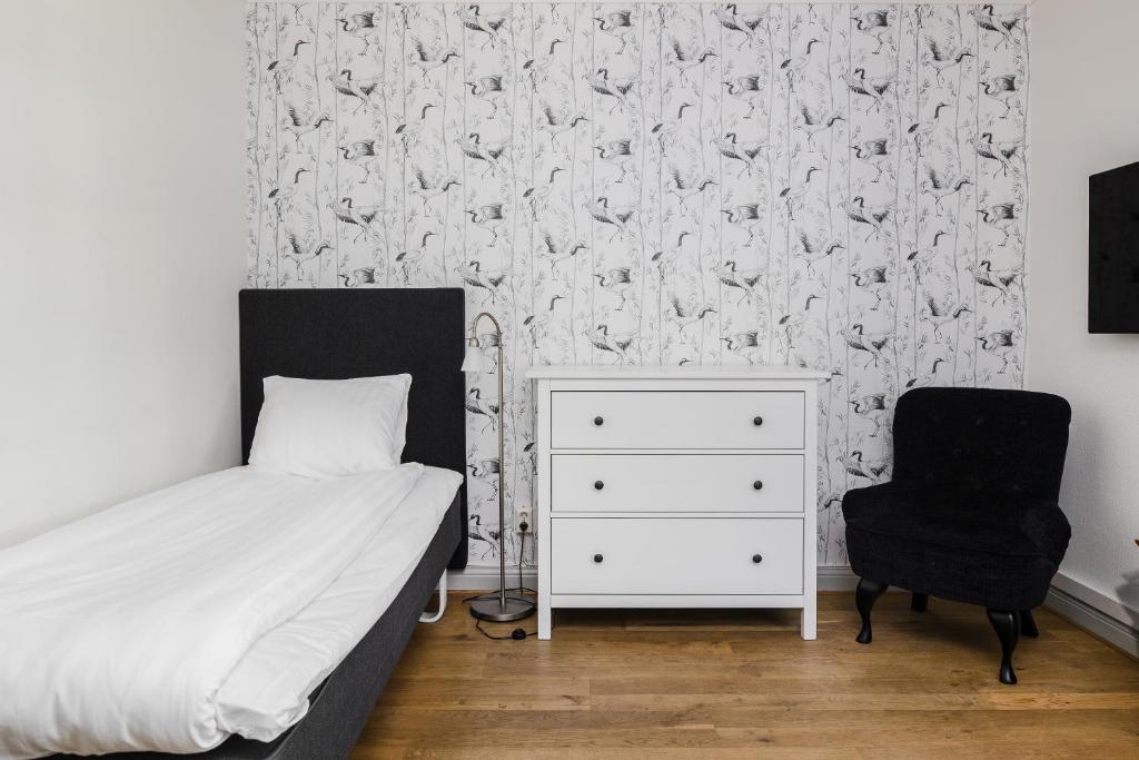 Postel nebo postele na pokoji v ubytování Hotel Gyllene Uttern
