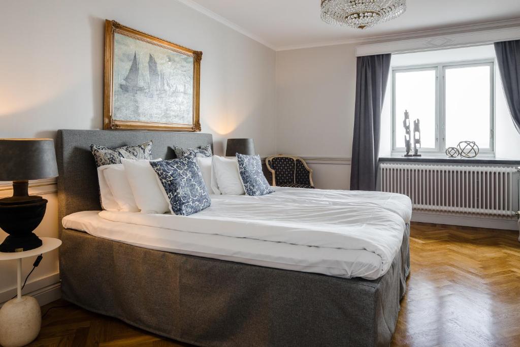 Postel nebo postele na pokoji v ubytování Hotel Gyllene Uttern
