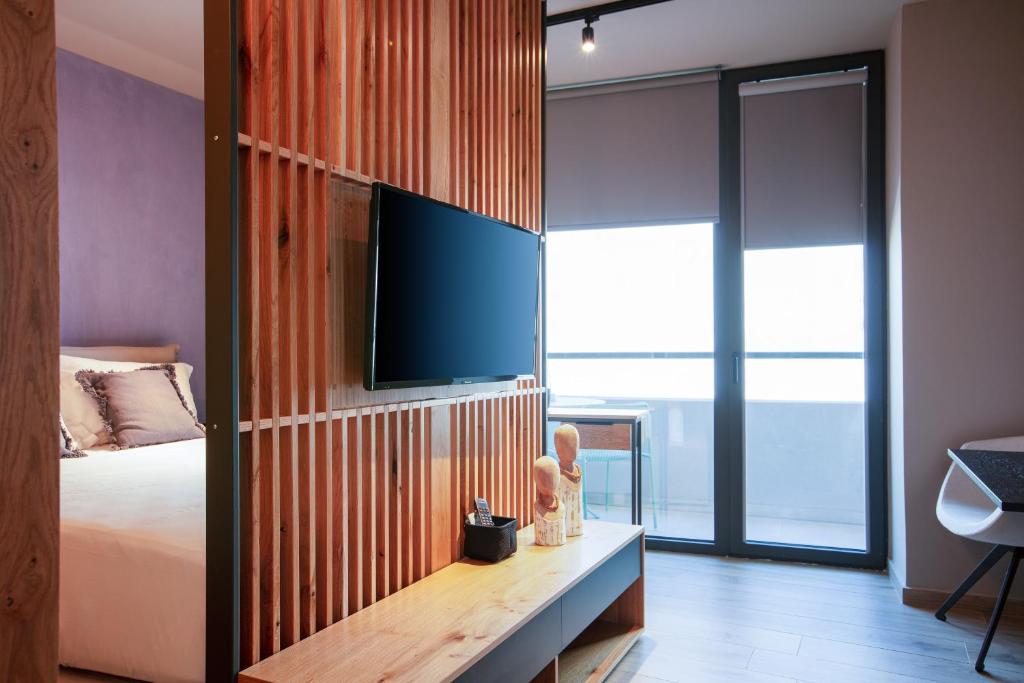 TV a/nebo společenská místnost v ubytování Souda Plaza Collection