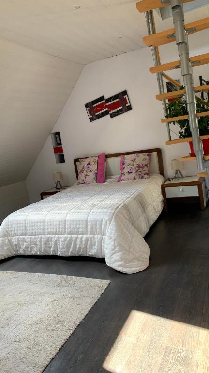 Posteľ alebo postele v izbe v ubytovaní Chalet l Écrin Vert