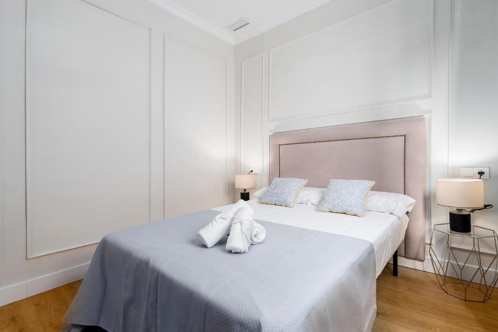 Posteľ alebo postele v izbe v ubytovaní Apartamento Plaza de la Merced 4 habitaciones