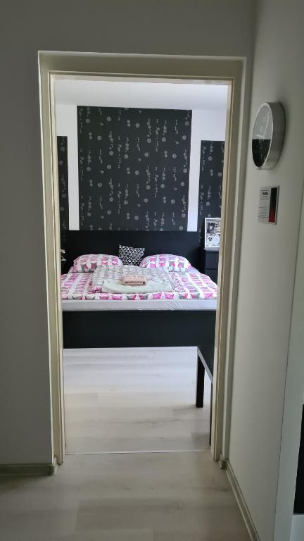 Postel nebo postele na pokoji v ubytování Zorka Apartman