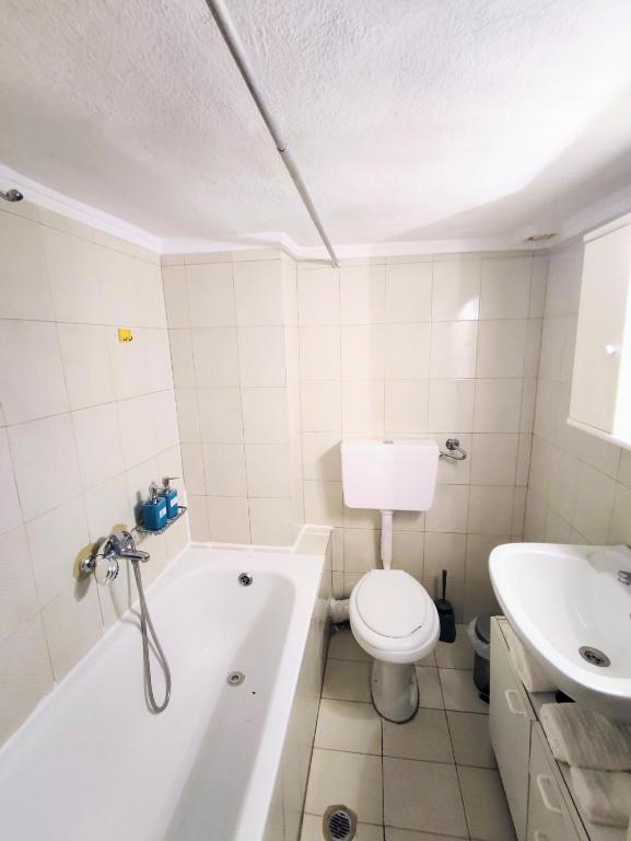 A bathroom at 3BR Spacious City Center