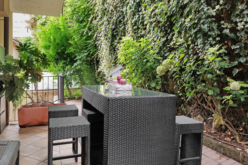 A garden outside Dani Apartment garda lake view