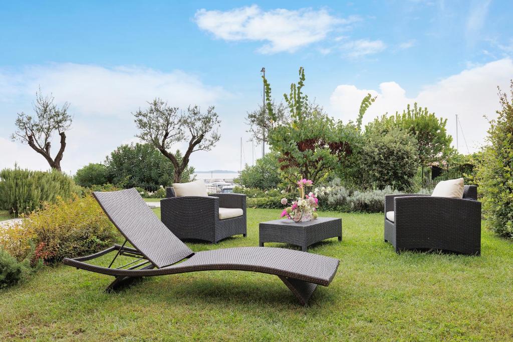 A garden outside Dani Apartment garda lake view
