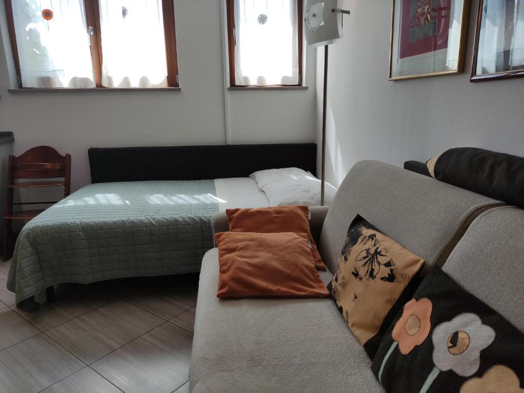 Postel nebo postele na pokoji v ubytování Apartments Leni