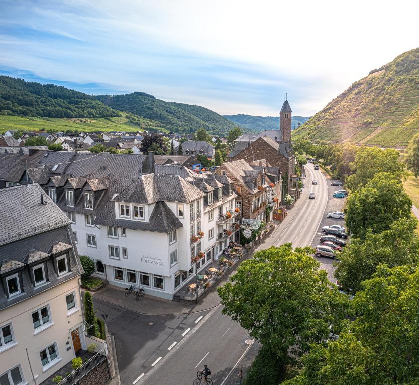 an aerial view of a town with a church at Hotel Restaurant Pollmanns in Ernst