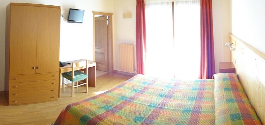 Postel nebo postele na pokoji v ubytování Albergo Ristorante Baraglia