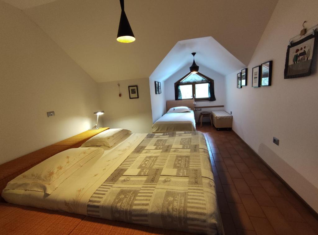 Postel nebo postele na pokoji v ubytování Apartments Leni